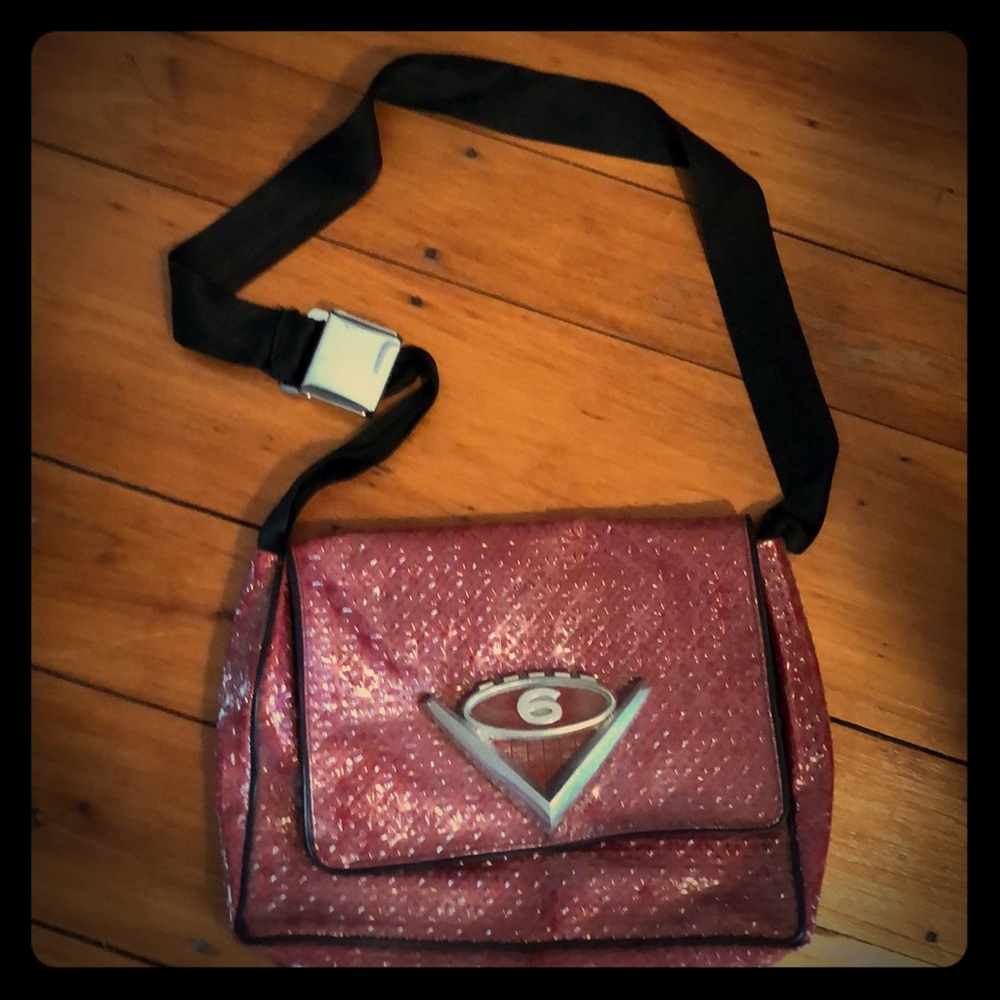 Vintage handbag with seatbelt strap
